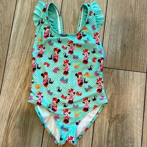 One piece teal Minnie Mouse swim suit